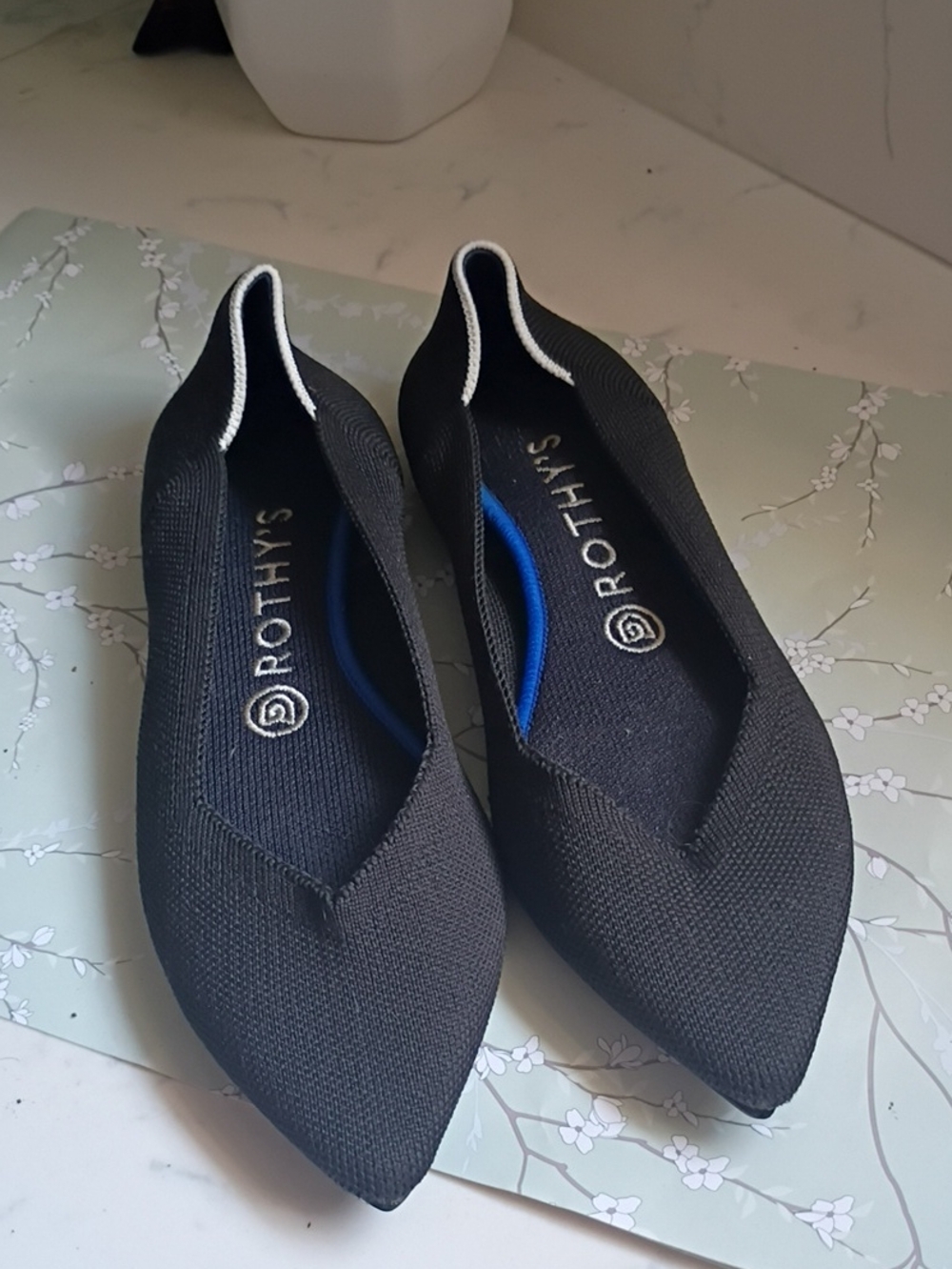 Rothy's Black Pointed Knit Flats with White Trim